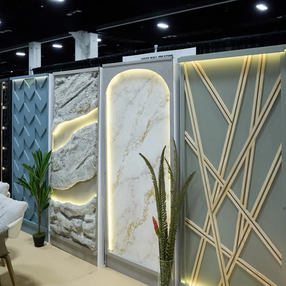 Illuminated accent wall panel display with stone, marble, and lattice finishes at an exhibitor booth